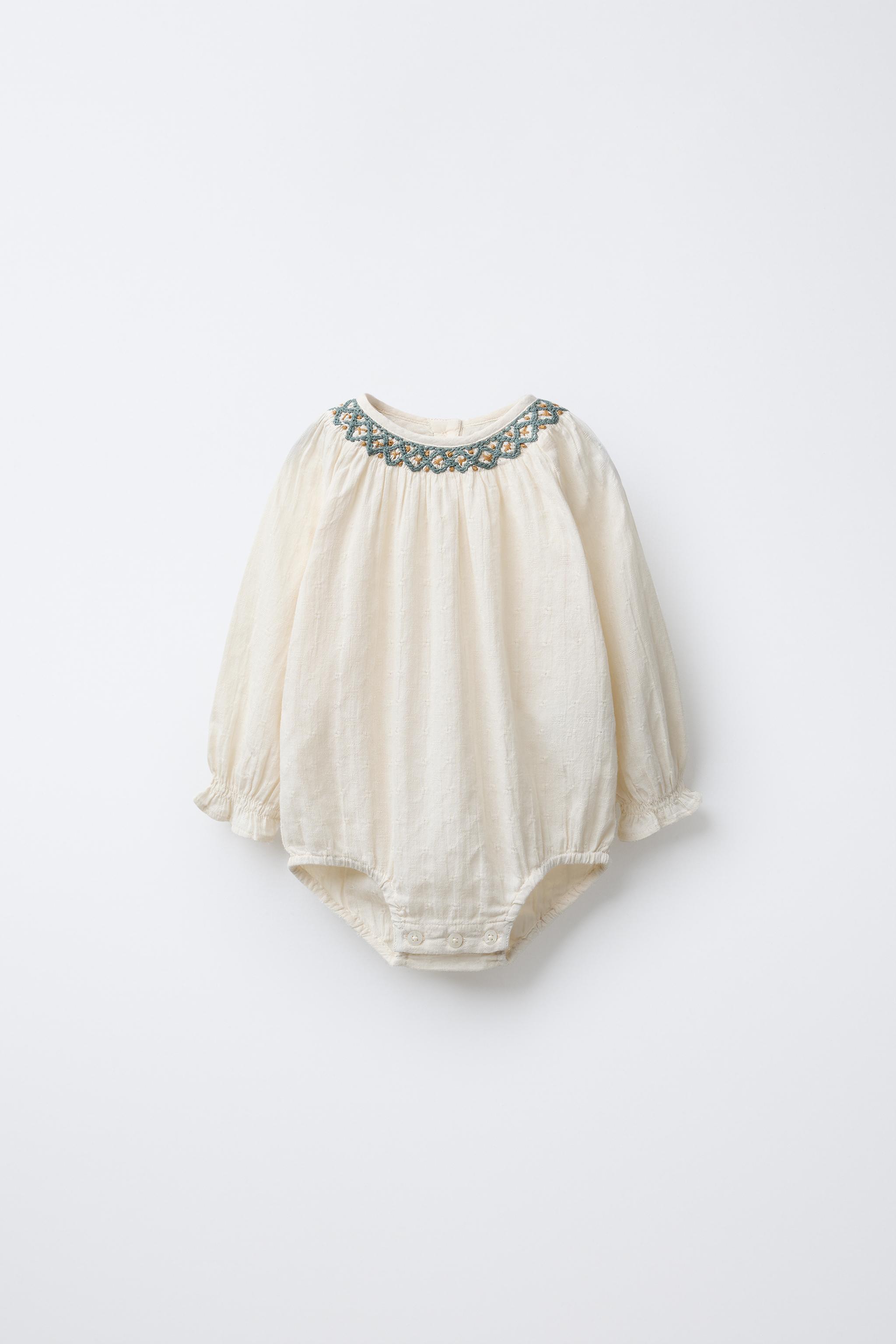 CONTRAST EMBROIDERED BODYSUIT